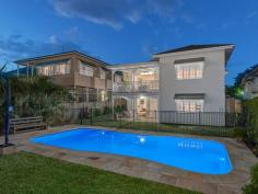 16 Merehaye St Wooloowin QLD 4030 The Inner City suburb of Wooloowin has long been a favourite with professionals and families simply by virtue of its location to the CBD and the delightful architecture that is lovingly preserved by house proud owners. 16 Merehaye Street Wooloowin is a perfect example of the retained Queenslander style of the 1930's coupled seamlessly with the modern edgy design to meet the demands of the family spread over 2 delightful levels. Simply, this home is delight in every respect. The owners have painstakingly restored and renovated this home creating a double level home of style and distinction, with multiple living areas, 5 bedrooms, 2 bathrooms, and 3 car accommodation all encapsulating the superb city views. The original home has been transformed with a renovation on the upper level starting at the kitchen and flowing throughout the entire home. The chefs kitchen is a delight. With timber cabinetry, stone benchtops, stainless steel European appliances, including 700wide gas cooktop and electric oven, dishwasher and rangehood, all central to the amazing full width servery that opens out to the covered deck with absolute city views. Adjacent to the deck are the informal meals area and lounge all atop beautiful solid timber floors, throughout the entire upper level. Also on this level are 4 bedrooms all generous in size and a superbly renovated family bathroom including freestanding bath, frameless glass shower, floor to ceiling tiles and quality and luxury in abundance, this is a delightful and relaxing space in keeping with the style of the home. On the lower level, accessed via a timber staircase, there is the Master Suite with ensuite, opening onto the rear yard and magnificent in ground pool and landscaped surrounds. Also on this level is a fully tiled lounge/rumpus room or media room, a study or home office and direct access to the rear yard and pool and 3 car accommodation. Additionally the home has ducted airconditioning throughout the upper level, ceiling fans throughout the entire home, and attention to detail at every turn. This is truly a home to be proud of in an ideal location, walking distance to Wooloowin or Albion City Rail stations, public and private schools and just 6 kilometers to the centre of Brisbane. Upper Level 2 Bedrooms, built-ins, ceiling fans 2 Bedrooms, ceiling fans 1 Family bathroom Living area with access to balcony Chef's Kitchen with timber cabinetry, stone benchtops, gas cooktop Dining area Lower Level 1 Master bedroom, ensuite, access to outdoor entertaining Office Living area Laundry 30sm lockable storage area Outdoor entertaining area Swimming pool Amazing city views 567m2 Block Ducted air conditioning Electric gates 3 Car accommodation Walking distance to public transport Close to shops Close to schools