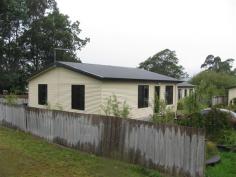 1/15 Gellibrand Street Zeehan Tas 7469 $120,000 Property Information Three bedroom Colourbond home set in cul-de-sac of 5 units with common parking area. This unit was built in 2009 and has been tenanted since. Open plan kitchen and dining which leads through glass sliding doors to private deck. The unit is heated by split cycle air conditioner providing all year comfort. Modern bathroom with shower and separate laundry. Call to discuss further or to organise inspection. Floor Area 76 sqm Land Size 362 sqm Approx year built 2009 Property condition Excellent Property Type Unit House style Bungalow Construction Cladding and Colourbond Joinery Aluminium Roof Colour bond Walls / Interior Panel sheeting Flooring Carpet Window coverings Blinds Heating / Cooling Split cycle a/c Electrical TV aerial Chattels remaining Split Cycle Airconditioner, Blinds, Drapes, Fixed floor coverings, Light fittings, Stove, TV aerial, Curtains Kitchen Modern, Upright stove and Breakfast bar Living area Open plan Main bedroom Double and Built-in-robe Bedroom 2 Single and Built-in / wardrobe Bedroom 3 Single Main bathroom Separate shower, Heater Laundry Separate Views Urban Fencing Partial Land contour Flat Grounds Tidy Water heating Electric Sewerage Mains Locality Close to schools, Close to shops