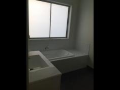 Unit 2/55 Horizon Drive Sorell Tas 7172 $265,000 Modern Home With Delightful Views 2/55 Horizon Drive, Sorell Price: S275,000 Unit size: Approx 102m2 Land area: Approx 265m2 THERE are delightful views away to Orielton Lagoon on Pittwater and beyond to Mt Wellington from this well-presented brick home with level, easy care and sunny grounds. Elevated above the township of Sorell in a rapidly expanding new homes area, the contemporary abode is well-laid out with a neutral décor. In a complex of three, the main entry is from a front verandah with timber decking to a bright, open plan lounge/dining area with a carpeted floor and a Fujitsu reverse cycle air conditioner. Adjoining is a neat, modern kitchen with an island workbench/breakfast bar, a ceramic cooktop, a stainless steel range-hood and a stainless steel under-bench oven, a tiled splashback and there's a pantry cupboard. A central hallway with an electric panel heater provides access to two good sized bedrooms with built-in wardrobes and the master also having an en suite bathroom while the tiled family bathroom has a bathtub, a separate shower bay, a vanity unit and a Tastic light/heater/exhaust. At one end of the hall is a handy powder room and at the other, the laundry with storage and door to the yard and nearby attached carport and concrete driveway for extra parking. There also is a quite private concreted barbecue area with rustic views. Property Snapshot Property Type: Unit Construction: Brick Veneer Land Area: 265 m2 Features: Built-In-Robes Close to schools Verandah