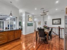 16 Merehaye St Wooloowin QLD 4030 The Inner City suburb of Wooloowin has long been a favourite with professionals and families simply by virtue of its location to the CBD and the delightful architecture that is lovingly preserved by house proud owners. 16 Merehaye Street Wooloowin is a perfect example of the retained Queenslander style of the 1930's coupled seamlessly with the modern edgy design to meet the demands of the family spread over 2 delightful levels. Simply, this home is delight in every respect. The owners have painstakingly restored and renovated this home creating a double level home of style and distinction, with multiple living areas, 5 bedrooms, 2 bathrooms, and 3 car accommodation all encapsulating the superb city views. The original home has been transformed with a renovation on the upper level starting at the kitchen and flowing throughout the entire home. The chefs kitchen is a delight. With timber cabinetry, stone benchtops, stainless steel European appliances, including 700wide gas cooktop and electric oven, dishwasher and rangehood, all central to the amazing full width servery that opens out to the covered deck with absolute city views. Adjacent to the deck are the informal meals area and lounge all atop beautiful solid timber floors, throughout the entire upper level. Also on this level are 4 bedrooms all generous in size and a superbly renovated family bathroom including freestanding bath, frameless glass shower, floor to ceiling tiles and quality and luxury in abundance, this is a delightful and relaxing space in keeping with the style of the home. On the lower level, accessed via a timber staircase, there is the Master Suite with ensuite, opening onto the rear yard and magnificent in ground pool and landscaped surrounds. Also on this level is a fully tiled lounge/rumpus room or media room, a study or home office and direct access to the rear yard and pool and 3 car accommodation. Additionally the home has ducted airconditioning throughout the upper level, ceiling fans throughout the entire home, and attention to detail at every turn. This is truly a home to be proud of in an ideal location, walking distance to Wooloowin or Albion City Rail stations, public and private schools and just 6 kilometers to the centre of Brisbane. Upper Level 2 Bedrooms, built-ins, ceiling fans 2 Bedrooms, ceiling fans 1 Family bathroom Living area with access to balcony Chef's Kitchen with timber cabinetry, stone benchtops, gas cooktop Dining area Lower Level 1 Master bedroom, ensuite, access to outdoor entertaining Office Living area Laundry 30sm lockable storage area Outdoor entertaining area Swimming pool Amazing city views 567m2 Block Ducted air conditioning Electric gates 3 Car accommodation Walking distance to public transport Close to shops Close to schools