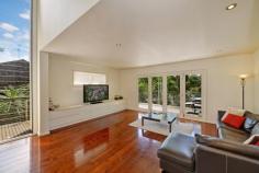 153 Riverview Street , Riverview NSW 2066 For Sale - Offers Over $1.95M This tastefully renovated contemporary family home offers space and tranquillity. A light-filled property enjoying a versatile floor plan ideal for indoor/outdoor entertaining. Features includes: * Four spacious bedrooms, master bedroom with en-suite, built-in wardrobe and balcony. * Large open family room and dining area with timber floors, air-conditioning and wrap around balcony * Ceaser Stone kitchen with large breakfast island and stainless steel Miele appliances * Separate formal lounge and dining with bi-fold doors at the leading to an alfresco dining deck and built-in spa * Guest bedroom/ office * Modern bathrooms * Modern internal laundry * Single lockup garage with off street parking for 1 or more cars * Attic storage.
