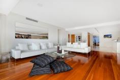 1/3 Northcliff Street, Milsons Point, NSW 2061 This exquisite harbourside residence is sure to impress the most discerning of buyers. Making the most of its stunning location, impeccably presented with 5 star finishes and intimate harbour outlook. Boasting large, open plan living and entertaining areas, with accommodation of superior quality. * Flowing open design with spacious living and dining areas encompassing the entire 1st floor. * Floor-to-ceiling windows maximize natural light and views. * Wide entertainers' terrace with spectacular harbour outlooks * Superb master bedroom with deluxe spa ensuite bathroom and custom wardrobes. * Double bedrooms are all equipped with built-in robes and ensuite. * Ducted A/C. Separate guest powder room. * Video intercom with private lift access to front door. Alarm system. * Customized, temperature controlled wine room. * Secure tandem car space plus additional car lift accommodation. * Stroll to North Sydney CBD, trains, harbourfront parks, cafes, restaurants and entertainment.
