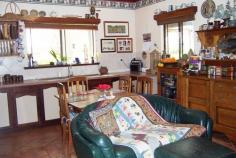 74 Walter St Balingup WA 6253 545,000 Property type: Acreage / Semi-Rural Suburb: Balingup (profile) Region: Southern Land area: 0 sqmCHARACTER AND CHARM This delightful 4 bedroom, 2 bathroom home, hidden on just over 4 acres, has warmth, character and a great feeling of homeliness. The welcoming country charm is apparent from the moment you enter through the front door, with it's beautiful leadlight insert and sidelights, to the little wooden steps leading up to the bedroom in the attic with panoramic views from the dormer windows. The home has a lovely cottage ambience, and is awaiting new custodians to enjoy it's character and charm. With many traditional features, the home has instant country appeal, yet has all the modern comforts of today. The farmhouse kitchen has terracotta style tiles, and a slow combustion stove to keep the home warm and cosy during cooler winter months. The lounge has beautiful views , ornate ceiling rose, and a welcoming brick fireplace. Another entry in to the house is through a welcoming tiled foyer, leading into a studio with high ceilings and exposed wooden framework. Established deciduous trees surround the house. In autumn and winter the leaves fall, allowing the light and warmth of the winter sun into the house. New leaves emerge in spring, and in summer the dappled light and canopy of the shady trees provide shelter for the cottage gardens and prolific bird life. Enjoy picking tree-ripened fruit from the assortment of fruit trees, and enjoy making pies or bottling fruit from the freshly-picked harvest. Country living doesn't get much better than this! The property also has a large workshop/garage and has two large rain-water tanks. For more information, please call either John or Sue on 97641089