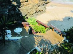 31 Alexander St Zilzie QLD 4710 $1,800,000 The property offers a unique access, to your privately owned section of beach. Legislative changes no longer allow other land owners to own beach. Situated at the end of the cul-de-sac, accessed via electronic gate, this home offers unsurpassed exclusivity, privacy and set amid other multi-million dollar homes. Designed to encapsulate the views from each room where the balconies are fitted with frameless freestanding glass balustrading. Enjoy the most amazing sunrises and sunsets as you watch the sea turtles feed amongst the rocks below or the dolphins play out front. If it’s entertaining you enjoy, you’ll love the galley style kitchen located centrally to the expansive living areas with stainless steel bench tops, walk-in pantry and quality appliances. There are a multitude of outdoor living spaces that have been designed for various weather conditions. The expansive master bedroom hosts an open double shower, spa, dual vanity, separate WC and walk-in robe. The remaining 4 bedrooms are King sized with built-in robes. There are 3 stylish bathrooms in total. Property Details Bedrooms 5 Bathrooms 3 Garages 2 Land Area 1674 m2