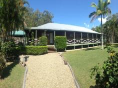 2510 Round Hill Rd Round Hill QLD 4677 It's not very often that we list such a large home on this scale. Are you looking to upsize? Alot? This former Bed and Breakfast has now come on the market for sale, 5 bedrooms all with ensuites and french doors opening onto the large timber Verandahs. Extra large lounge room, formal dining room and seperate kitchen. The main Bedroom has an office plus parents retreat. Of course size was no issue when this Homestead was constructed as there are wide breezy wrap around verandahs over looking the sparkling inground pool, Bbq deck and superb landscaped gardens. All this on 45 beautiful Acres. Polished cypress floors, new carpets and curtains, high ceilings and recently painted. 2 Seperate sheds 1 is a 2 bay the the second is a 3 bay constructed in colourbond. Water is supplied by 5 rainwater tanks and 2 dams. The wildlife is abundant. Call Cam today Inspections Inspections by appointment only. Features General Features Property Type: House Bedrooms: 5 Bathrooms: 5 Indoor Living Areas: 3 Built in Wardrobes Outdoor Garage Spaces: 5 Deck Outdoor Entertaining Area Shed Fully Fenced Swimming Pool - Inground Eco-friendly Water Tank Greywater System