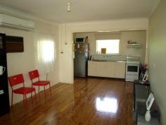 18 Market Street Tahmoor NSW 2573 Price: $365,000 Located close to town on a level 1012m² corner block is this potential gold mine! At present there is a renovated (inside) two bedroom home, one with built in robe, basic kitchen and bathroom, good size living area with split system r/c air con and polished timber flooring throughout. There is recently completed kerb and guttering to one frontage and all services available. Please note this property is currently tenanted and require 48 hours notice prior to inspections.