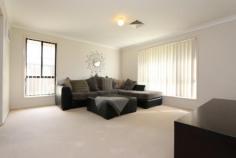 14 Belmar Street RUTHERFORD NSW 2320 $338,000 This quality modern three bedroom home offers plenty of space and is immaculately presented throughout. Combining light filled free flowing interiors with generous bedroom sizes this low maintenance gem also features ducted air conditioning for year round comfort. Ensuite to the main bedroom, double garage and a spacious, fully fenced rear yard add to the creature comforts. Close to the major amenities such as shopping centres, schools and sporting fields this is a terrific purchase for the family wanting quality and convenience.