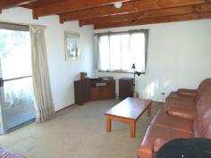 6 Merry Street Kioloa NSW 2539 OFFERS MID $300,000 This unique ‘chalet’ style beachside cottage is located in a quiet cul-de-sac and is less then 300m from gorgeous Merry Beach or 5 minutes walk from the unspoilt Murramarang National Park. Offered fully furnished, you could buy today and spend quality time with the family next weekend. Features include 2 bedrooms, a loft which could be a third bedroom/child’s play area, separate dining, carport and laundry/storage room. In its current configuration the home easily accommodates 2 adults and 3 children.