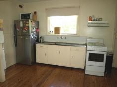 18 Market Street Tahmoor NSW 2573 Price: $365,000 Located close to town on a level 1012m² corner block is this potential gold mine! At present there is a renovated (inside) two bedroom home, one with built in robe, basic kitchen and bathroom, good size living area with split system r/c air con and polished timber flooring throughout. There is recently completed kerb and guttering to one frontage and all services available. Please note this property is currently tenanted and require 48 hours notice prior to inspections.
