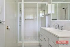 23 Running Creek Rd Kilkivan QLD 4600 $345,000.00 *4 bedroom, 2 bathroom lowset brick home *Media room or 5th bedroom, formal entry *Open plan kitchen, dining & living area *Sec screens, ceiling fans, air conditioning *Huge undercover patio & BBQ area *11m x 4m x 3.5m shed plus 6m x 3.5m shed *2 x carports, 3KW solar, 2 x 10,000L tanks *Fully fenced 1 acre, fire pit & views FOR SALE: $345,000 Nothing more to do, nothing more to spend! Just sit back, relax and enjoy yourself in a superb, quality home whilst enjoying the quaint, rural, country town charm and lifestyle that Kilkivan has to offer! * Beautifully maintained and presented, quality lowset brick veneer home * 4 large carpeted bedrooms all with ceiling fans and built in wardrobes * Main bedroom features large built ins, air conditioning and huge modern ensuite * Separate media room, could be used as a 5th bedroom option or guest sleep-out * Formal entry leads to tiled open plan kitchen, dining and air conditioned lounge * Lounge opens onto huge, private undercover pebblecrete patio and BBQ area * Large kitchen with modern, quality appliances, loads of storage and big pantry * Roomy laundry with linen storage and easy access to patio and clothesline * Security screens, blinds and ceiling fans throughout, satellite TV * Large 11m x 4m x 3.5m shed with high clearance roller door, suitable for caravan or boat * 6m x 3.5m lockable, powered shed with workbench can be used as extra garage * 2 x extra carports with shade screens, 3KW solar system * Connected to town water supply with the added bonus of 2 x 10,000L rainwater tanks * Fully fenced one acre block with lovely established trees and gardens * Quality landscaping, fire pit, privacy and views of the mountains * 1km to town, school bus service to Gympie high schools, less than 40 mins to Gympie * Central to Gympie, Goomeri, Murgon, Bjelke-Petersen Dam and the South Burnet wine trail All of this within walking distance to Kilkivan town with cafes, shops, hotel, primary school, parks and sport facilities. This is affordable, quality living, central to everything the South Burnett and Gympie regions have to offer! Copy & paste the following link to view property video:- http://youtu.be/P6_WcjKGOuk Disclaimer All the above property information has been supplied to us by the Vendor. We do not accept responsibility to any person for its accuracy and do no more than pass this information on. Interested parties should make and rely upon their own enquiries in order to determine whether or not this information is in fact accurate. Intending purchasers should seek legal and accounting advice before entering into any contract of purchase.