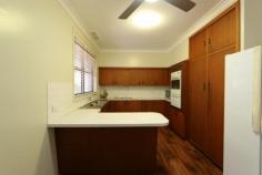 26 Maher Avenue EAST MAITLAND NSW 2323 $408,000 SITUATED in the heart of East Maitland five minutes from everything you need, including the soon-to-expand Greenhills Shopping Centre, is this ideal north-facing family home on the high side of the street. Newly carpeted and painted this home boasts four spacious bedrooms, three complete with built-in wardrobes, meaning plenty of space for the new or growing family. Both bathrooms are recently renovated and the second can be found off the laundry and features a toilet and also a shower. Floorboards have been laid throughout the high traffic areas and in the kitchen and dining area as well as the spacious lounge room helping to create a sense of space. All of this on a fully-fenced spacious block with a covered veranda to relax and unwind on. Agent declares interest.