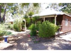 14 North St Nannup WA 6275 $410,000 Key Details property ID 322283 land size 1000.00m2 Description CHARACTER JARRAH HOME Built to exacting standards in the natural materials of mainly jarrah with stone features this home is for the purist. A comfortable 3 x 1 with master bedroom looking out onto a verandah with views of a small lake you would be surprised that you are living in town central to all your needs. The kitchen dining and lounge are combined with high ceilings and exposed timberwork with northern light being filtered in through high windows in the roof. A verandah facing north off the main living area expands the space and allows lots of room for entertainment. The home is surrounded by large mature trees and an easy to keep garden. It’s a rare gem