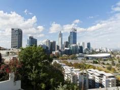 2/14 Bellevue Terrace West Perth WA 6005 FOR SALE PRICE: OFFERS FROM $3,950,000 COUNCIL RATES: $3,410 per year WATER RATES: $2,236 per year STRATA LEVY: $8,661 per quarter INSPECTION: Contact agent for details BEDROOMS: 3 BATHROOMS: 3 CAR SPACES: 3 DAZZLING VIEWS FOREVER Bellevue Terrace has been the jewel in the crown of residential real estate in Perth. The building stands on the boundary of beautiful Kings Park commanding an endless vista across the city to the Darling Ranges and the Swan River. 14 Bellevue contains 5 apartments over 6 levels and was architecturally designed to maximise the advantages of the site and provide comfortable luxurious residences that would do justice to the exclusive location. On the lower level there is the generous sized master suite with a huge walk in robe and en suite bathroom. Off the main bedroom there is a large living and dining area complete with a built in gas fire place. The living room has access to a large terrace, perfect for entertaining whilst overlooking the Swan River and City. The fabulous kitchen and family room are adjacent to the private courtyard. The upper lever consists of 2 secondary bedrooms as well as the study area and split bathroom. The apartment complex boasts a recently renovated heated indoor swimming pool, spa and sauna. There is also secure garaging on the basement level for 3 cars. With breathtaking views in a fabulous location this property is a must see.