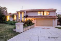 7 Campion Cres Attadale WA 6156 HOUSE FOR SALE $1,250,000 Open Home: Sat 21st Mar 12:00pm-12:45pm Your Family Dream! Keep everybody happy with the acquisition of this charming 4 bedroom plus study , 2 bathroom residence in a whisper-quiet street opposite the sprawling Wal Hughes Park bushland and close to absolutely everything else. Fantastic design sees the upstairs games/living room tower above everything else, comprising of a built-in timber bar, high ceilings, Venetian blinds, comfortable carpet and a beautiful lush outlook. The study or home office looks out to the swimming pool and can even be a formal dining room if need be, whilst a private master ensemble is separate from the remaining sleeping quarters and feature his and hers wardrobes and a shower and toilet to the ensuite bathroom. The tiled casual meals area is spacious and the family room is overlooked by a massive kitchen with delightful timber cabinetry, tiled splashbacks, a walk-in pantry, an Emilia gas cook top/oven and a Westinghouse dishwasher. Off the family zone, an intimate patio features a servery window from the kitchen, whilst a stunning separate outdoor setting includes caf blinds, two ceiling fans, a bar/sink/food preparation area and a powered storage shed all by the shimmering below-ground pool. There is also the potential to build up and enjoy future city views in a wonderful location close to schools, shopping, cafes, the picturesque Swan River itself and Attadale's lush nature reserve. Just in time for summer! Other features include, but are not limited to: Tiled family area with outdoor access to patio and pool Carpets to all bedrooms 2nd/3rd/4th bedrooms have built-in robes and desks Views of backyard lawns from 4th bedroom Fully-tiled main bathroom with a separate bath tub, shower and heat lights Laundry with broom cupboard and outdoor access Separate toilet Double linen press Remote-controlled double garage with under-stair storage and power points throughout Rear driveway access with double gates, to park a small boat or trailer High ceilings to entry Low-maintenance flooring Ample driveway parking Refrigerated reverse-cycle air-conditioning Security alarm system (with panic button) Bore reticulation Solar hot water system Insulation Foxtel connectivity Side access 784sqm block (approx.) Leafy Attadale street location close to Santa Maria College, Attadale Primary School and Mel Maria Primary School Only a 10-minute drive to Fremantle and less than 25 minutes to the city
