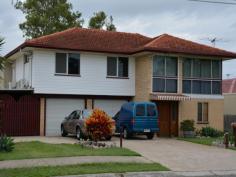 13 Anna Marie St Rochedale South QLD 4123 $495,000 Features General Features Property Type: House Bedrooms: 3 Bathrooms: 2 Land Size: 812 m? (approx) Indoor Living Areas: 3 Toilets: 2 Workshop Built in Wardrobes Dishwasher Rumpus Room Split system Air Conditioning Outdoor Remote Garage Carport Spaces: 2 Garage Spaces: 2 Deck Fully Fenced Inspections Inspections by appointment only. Extra Large Highset Home ? The upstairs of this property is air conditioned throughout with 3 built-in bedrooms, modern kitchen and bathroom, extended lounge/dining and a separate family room. The living flows out to the enormous rear covered deck ? fantastic for entertaining. Downstairs has a rumpus which can be sectioned off for a separate office area and also a 2nd bathroom. The multi-car garaging (remote garage doors) is a must for anyone who has lots of cars, lots of tools or just lots of stuff. The double enclosed carport also gives access to the big rear fenced yard. The block is 812m2 and there is also 5,000 gallon water tank. Heaps of room for kids to play and plenty of room for a pool if you wanted one. The location is very handy, walking distance to bus, shops, schools and a short drive to freeway access and several shopping centres. Just what the Family ordered!