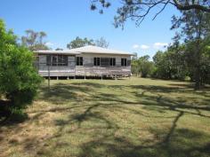 250 Schilling Lane Calliope Qld 4680 HIGHLY SOUGHT YET RARELY FOUND From the moment you cross the grid and drive onto this tree studded property you will immediately feel at home. Situated on the outskirts of Calliope this property is calling out for an owner to make it their home. Set on 4.47 picturesque hectares (11.05acres) the property is offered fenced and with a partially complete 3 bedroom home. This solid hardwood framed home has been restumped and re-roofed and the majority of the internal walls are sheeted. The wiring in the house has been renewed and most of the windows have been fitted. The home is also sold with a number of building items such as some lights, timber, sheeting, new bath and electrical items included in the sale. Stick with the current proposed layout of the home, add a deck to take in the country outlook and cool breezes or easily modify the plan to suit your own lifestyle. Plenty of opportunity here. Adjacent the home is an older style double garage. The block has power to it (just requires connection to the home), there is an existing septic system and dam located on the front of the block. If you are looking for a project that you can add your own touches to then this is one for you! Last time Calliope Real Estate marketed a property of this nature we were inundated so don't miss your chance to secure this one. This package is sure to appeal, and offers you room for the children’s pony, vehicles, or just peaceful, country living only minutes from all amenities. The Auction is to be held onsite on the 2nd May 2015, at 11am or secure this little gem by negotiation prior to Auction. Call Emma Dingle 0419 714 937 to arrange your inspection