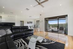 51 Craig Parry Drive Hidden Valley Vic 3756 4232Price Guide: Interest from $630,000 | Type: House | ID #208496 Resort Style Living on the 5th Green Leave the hustle and bustle behind you as you arrive home to relax in this alluring abode. With the beautiful Hidden Valley golf course as a backdrop, you can sit back, relax and unwind in the spacious eleven person spa offered by this premium property. Set adjacent to the green on a generous 1494m2 allotment, this attractive family home offers superb attention to detail, coupled with modern functionality. The open plan living includes kitchen, family and dining rooms with frameless glass stacker doors that overlook the large alfresco area. The galley kitchen features stone bench tops and splashback, double-sided breakfast bar, double wall oven and 900mm gas cook top, all adjacent to a spacious butler's pantry. A separate theatre room provides a great hideaway for the movie enthusiast, or a place to relax and enjoy the warmth of a gas log fireplace. The master suite includes a mirrored glass walk in wardrobe, en suite and an opulent stone bath tub to unwind in after a long day. The remaining three bedrooms feature built in mirrored wardrobes and are set amongst another stunning bathroom with separate toilet. Outside, the triple garage offers three metre high doors which can accommodate a horse float or caravan, with still enough space for two or more vehicles. Additionally, the garage includes built in cabinetry with sink and a rear roller door. Landscaped gardens, exposed aggregate driveway, secure pet fencing plus much, much more. This is truly a fine home. **Sale By Set Date - Tuesday 31st March 2015 at 5pm*