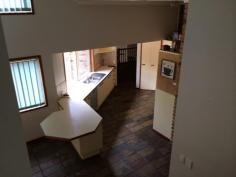 5/30 Dorset Drive "Cornwall Close" Springwood Qld 4127 $692,000 Features General Features Property Type: House Bedrooms: 4 Bathrooms: 2 Land Size: 2003 m? (approx) Indoor Ensuite: 1 Living Areas: 3 Toilets: 2 Built in Wardrobes Dishwasher Split system Air Conditioning Ducted Heating Open Fireplace Outdoor Remote Garage Garage Spaces: 2 Deck Outdoor Entertaining Area Swimming Pool - Inground Inspections Inspections by appointment only. Set in a private court this architecturally designed property is one of a kind. The home takes full advantage of the gently slopping 1/2 acre block with several different levels of living which overlook the large outdoor entertainment areas and inground pool. The main bedroom is big enough for a parents retreat and also has a walk in robe and very modern ensuite. On this same level is a study or office area. The other 3 built-in bedrooms are on the lower level with the modern family bathroom and large laundry. The kitchen has many cupboards, pantry, dishwasher and gas hotplates, it also overlooks the pool and the beautiful bushland at the rear of the home. Close to Schools and local shops with only a short drive to access the freeway north and south - this is a very good location.
