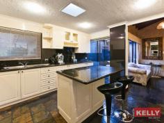 27 Matthew Ave Leeming WA 6149 For Sale $750,000 HOME OPEN SAT 21/03 @ 1:30 - 2:00PM THE GRAND FAMILY ENTERTAINER - A MUST VIEW! Everyday is a holiday in this stunning residence! Located at the end of a cul-del-sac, this quality Leeming home is built on a on a massive 856 m2 block designed for an active and water-loving family. On entry, you will be greeted by soaring ceilings in the living and dining areas, overlooking an alfresco paradise that captivates you with a Hawaiian style swimming pool, a heated spa, a Balinese pergola and a secret garden decked with outdoor statues and lush gardens. Be entertained at your very own Grand Victorian home bar in the 2nd living area as well as a modern kitchen fitted with granite stone bench top, island breakfast bar and high quality appliances. To the end of the hallway, it reveals a plush master ensuite with walk-in robe and a large luxurious bathroom with double vanity. On the other side, you will find 2 other bedrooms and the common bathroom with a spa bath. Enjoy absolute convenience as you will be just minutes away from Kwinana Freeway, Murdoch University, St. John of God Hospital, Fiona Stanley Hospital, Stockland Bull Creek Shopping Centre, Leeming Shopping Forum and all other local amenities. Features at a Glance: * Multiple and Separate Living areas * Master Ensuite and 2 Bedrooms * 1 Gym/Study Room * 1 Common Bathroom and WC * Separate Laundry Area and WC * Evaporative Ducted Air-Conditioning and Gas Hot Water System * Large Alfresco Area surrounded by timber decks and lush gardens * Outdoor Storage Room * Security Gate & Parking up to 5 cars If you are looking to indulge in the best of lifestyle living, this property is a must see. Contact Rachel Teng 0431 007 610 rachel@lauriekelly.com.au or Laurie Kelly 0418 927 898 laurie@lauriekelly.com.au today for an inspection