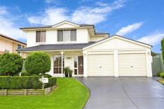 17 Coolabah Crescent, Glenmore Park, NSW 2745 $639,000 - $689,000 Perfectly positioned on the high side of a whisper quiet street in the highly sought after 'Blue Hills' estate, this beautifully presented 'Bellevale' will appeal to those looking for a home they can simply move into and enjoy. Set amongst stunning established gardens and manicured lawns, featuring 4 generous bedrooms, formal and informal living area's, ducted air, alarm, huge undercover entertaining area and much more. Low maintenance lifestyle in a great location surrounded by quality homes. PERFECT!!