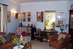 74 Walter St Balingup WA 6253 545,000 Property type: Acreage / Semi-Rural Suburb: Balingup (profile) Region: Southern Land area: 0 sqmCHARACTER AND CHARM This delightful 4 bedroom, 2 bathroom home, hidden on just over 4 acres, has warmth, character and a great feeling of homeliness. The welcoming country charm is apparent from the moment you enter through the front door, with it's beautiful leadlight insert and sidelights, to the little wooden steps leading up to the bedroom in the attic with panoramic views from the dormer windows. The home has a lovely cottage ambience, and is awaiting new custodians to enjoy it's character and charm. With many traditional features, the home has instant country appeal, yet has all the modern comforts of today. The farmhouse kitchen has terracotta style tiles, and a slow combustion stove to keep the home warm and cosy during cooler winter months. The lounge has beautiful views , ornate ceiling rose, and a welcoming brick fireplace. Another entry in to the house is through a welcoming tiled foyer, leading into a studio with high ceilings and exposed wooden framework. Established deciduous trees surround the house. In autumn and winter the leaves fall, allowing the light and warmth of the winter sun into the house. New leaves emerge in spring, and in summer the dappled light and canopy of the shady trees provide shelter for the cottage gardens and prolific bird life. Enjoy picking tree-ripened fruit from the assortment of fruit trees, and enjoy making pies or bottling fruit from the freshly-picked harvest. Country living doesn't get much better than this! The property also has a large workshop/garage and has two large rain-water tanks. For more information, please call either John or Sue on 97641089