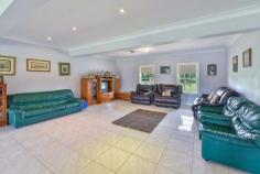 145 Lyrebird Road Pheasants Nest NSW 2574 Offers Over $950,000 Come and inspect this American Style Cape Cod home on nearly 10 acres. Consisting of the following: Main house with 5 double size bedrooms, main with ensuite and all with built in robes. Large lounge and dining rooms with tiled flooring, American Oak kitchen with stainless steel appliances, separate main bathroom with spa bath and separate W.C, ducted air conditioning, large double garage with internal access plus another bathroom and lounge room/family room upstairs. This property would suit multiple families as within the main house there could easily be a granny flat (with minor conversion) plus outside there is a fully self contained two bedroom granny flat (currently tenanted and rented at $300 per week) with it's own separate yard. The land is semi cleared backing onto a scenic gorge, three boundaries are fenced with electric gates at the entrance, 3 separate paddocks, large dam and a 100,000 litre water tank. Located in a quiet cul-de-sac and with loads of street appeal, make sure you inspect soon!! Pheasants Nest is located between Picton and Bargo with easy freeway access and only approximately 1 hour to Sydney.