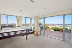 24/5-7 Martins Avenue, Bondi NSW 2026 Set against an inspiring ocean, beach and district backdrop this impeccable two level penthouse showcases cool modern style throughout with impressive proportions, a range of quality finishes and a sensational Pacific Ocean panorama. Featuring expansive indoor/outdoor living space, it enjoys a great sense of privacy and security with no common walls and a layout that takes full advantage of the superb outlook and provides an exceptional entertainers residence in a sought-after coastal setting. Huge 4 bedrooms, 2 baths and garage, approximately 300 sq metres on title. Own rooftop terrace & 360 degree views. Upper level master with spa bath ensuite.