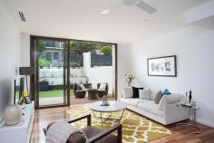 4/95 Wentworth Street, RANDWICK, NSW 2031 Drawing inspiration from the Australian landscape and seamlessly blending the raw and refined, Akora brings a fresh level of sophistication to the northern Randwick precinct and is a new landmark in this sought after address. The Townhouse @ Akora is a tribute to bespoke understated luxury, a restrained neutral palette and a feeling of space and light throughout. This townhouse features the entire ground level dedicated to open plan living and dining flowing to landscaped courtyard gardens for ease of entertaining and a stunning caeserstone kitchen showcasing Bosch appliances. Upstairs the 2 bedrooms both with fabulous built-in robes (main with ensuite), main bathroom (with bath) and hidden internal laundry. A selection of the finest finishes include beautiful spotted gum timber flooring, porcelain floor tiles, custom joinery, ducted reverse cycle air conditioning, security intercoms and alarms. Featuring a single basement car space plus secure storage cage, a private rear lane entry via Waverley Street into the courtyard garden.