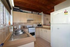 18/50 Monash Road Loganlea Qld 4131 215000 Two storey townhouse in excellent complex in Loganlea with a tenant already in place with a lease until 30 November 2015 at $275 per week. Features Include; * 2 Spacious Bedrooms with Built In Robes * Main Bedroom with Air Conditioning & Ceiling Fan * Bathroom with Shower over Bath, Vanity & Toilet * Linen Cupboard * Air Conditioned Lounge with Exposed Beams & Timber Ceilings * Kitchen with Servery to Living Area * Rangehood Plus Overhead Cupboards * Gas Cooking & Hot Water Service * Laundry with Second Toilet * Security Screens and Doors * Lock Up Garage * Front & Rear Courtyards * Low Body Corp Fees of Approx $1,355 per year * Council Rates Approx $696 Per Quarter Including Water Call now to arrange an inspection. Bedrooms 2 Bathrooms 1 Garages 1 Land Area 112 m2