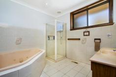 4 Pretty Sally Dr Wallan VIC 3756 4233Price Guide: $490,000 - $540,000 | Type: House | ID #193978 Space and Individuality In one of Wallan's premier addresses, this home exudes character and space from the moment you step in the door. Offering generous living areas, highlighted by a massive open plan family room and huge timber kitchen, with vaulted ceilings, the home is ideal for the entire family. All bedrooms are well proportioned, with the main bedroom featuring walk through robe and en suite. A large undercover entertaining area overlooks the rear family sized backyard, which includes shed with concrete floor and power. Other Benefits of this magnificent home include, separate study/fifth bedroom, side access, huge three car garage with additional storage and plumbing, under house workshop and solar panels