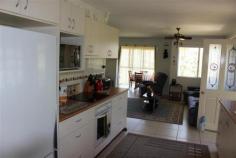 6/277 Haly Street Kingaroy Qld 4610 $178,000 PERFECT STARTER / INVESTMENT 2 1 1 This double level townhouse offers the investor or owner/occupier an easy-care comfortable living option. Situated within walking distance to the Kingaroy CBD, schools and community pool it is in excellent order/presentation. 24 hours notice required as tenants are in place. Features include:- Upstairs -2 bedrooms with built-in robes and fans -Bathroom/toilet Downstairs -Living area -Kitchen with breakfast bar -Reverse cycle air-conditioner -Single lock-up garage -Laundry and 2nd toilet -Covered and screened alfresco area -Large backyard and rainwater tank -Close to shops, school and pool -Situated well off the street Call now for an inspection. Inspection Times Contact agent for details Land Size 176 m2