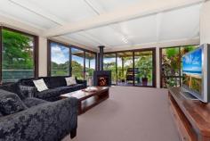 25 Moonbi Crescent, Frenchs Forest, NSW 2086 Offers Over $915,000 A family home, central to everything in a quiet cul de sac, enjoying secluded bush views and a sense of being miles from the hustle and bustle. From the moment you enter you'll be captivated by the never to be built out, serene treetop views. On entry level, an expansive living area opens directly to the generous wraparound covered deck. A cosy slow combustion stove makes this space inviting in all seasons. Three good sized bedrooms are serviced by a family bathroom with spa. The lower level offers versatility with a workshop, storeroom, laundry and possible home office with access to the rear garden. The palm fringed, in-ground swimming pool and low maintenance gardens further enhance the tropical hideaway ambience. Just a short walk to schools, Forestway Shopping Centre and city buses. This residence offers the opportunity to further enhance its appeal with your own individual style.