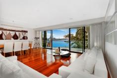 1/3 Northcliff Street, Milsons Point, NSW 2061 This exquisite harbourside residence is sure to impress the most discerning of buyers. Making the most of its stunning location, impeccably presented with 5 star finishes and intimate harbour outlook. Boasting large, open plan living and entertaining areas, with accommodation of superior quality. * Flowing open design with spacious living and dining areas encompassing the entire 1st floor. * Floor-to-ceiling windows maximize natural light and views. * Wide entertainers' terrace with spectacular harbour outlooks * Superb master bedroom with deluxe spa ensuite bathroom and custom wardrobes. * Double bedrooms are all equipped with built-in robes and ensuite. * Ducted A/C. Separate guest powder room. * Video intercom with private lift access to front door. Alarm system. * Customized, temperature controlled wine room. * Secure tandem car space plus additional car lift accommodation. * Stroll to North Sydney CBD, trains, harbourfront parks, cafes, restaurants and entertainment.