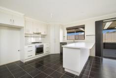 61 Kulin Dr Kilmore VIC 3764 3222Price Guide: $295,000 - $325,000 | Type: House | ID #208882 It's a Winner Perfectly presented home both inside and out situated on 508 sq. metre corner allotment. This very appealing 3 large robed bedroom home boasting ensuite to main, two large living areas, fully appointed kitchen area opening out onto large paved undercover alfresco area double garage and 2.5 m x 3m colorbond shed. Other features include ducted heating split system air conditioner and side entry, ideal for investor or first home buyer. Photo ID Required