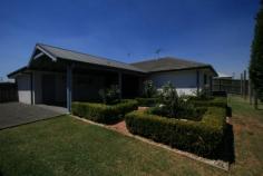 56 Poplar Level Terrace EAST BRANXTON NSW 2335 Excellent street location this brick and tile home offers generous proportions. Affording four large bedrooms, ensuite and walkin robe to main, large gallery style kitchen, separate formal lounge and rumpus rooms. There are vaulted ceilings in the living areas and ducted air conditioning for year round comfort. Stepping outside there is a double garage with internal access and a large undercover entertaining area with distant mountain views. All this situated on a large fully fenced block with side access. $429,000