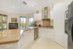3/11 Brisbane Street Berwick Vic 3806 Price Guide: $730,000 plus buyers | Land: 301 sqm approx | Type: Townhouse | ID #217012 Quality Without Compromise in Olde Berwick Luxuriously appointed throughout, this impressive townhouse is located in the heart of Olde Berwick in one of the most desirable streets. Superbly crafted by the Harmon Group, this home has been built and maintained to a meticulous standard and offers the finest inclusions. Spread across two levels the home features 3 bedrooms, 2 bathrooms, a powder room, large open plan formal lounge and dining room, informal family and meals area plus a separate study/library. The master bedroom is located on the ground floor and is equipped with built in robes, a full ensuite including oversized shower and vanity which is complimented by a stone bench top. The two remaining bedrooms are upstairs with built in robes alongside the 2nd bathroom complete with corner spa. Granite bench-tops and quality stainless steel appliances feature in the kitchen which overlooks the family room and offers direct access to the paved courtyard and decking, making outdoor entertaining a delight. Highlight features include established gardens and fernery, 2,500L water tank and alarm plus there is ducted heating and air conditioning throughout the home and gas log fire in the family room for year round comfort. Just a short stroll takes you to the main street which is home to an array of restaurants, cafes, parks, boutique shops and medical suites. A double garage with remote entry and internal access cap off this magnificent package and being one of only six townhouses in a gated community, this home is too hard to pass up. Call today to avoid disappointment