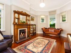 8 Park Ave Gordon NSW 2072 "WOODEND" FEDERATION BEAUTY, STROLL TO RAIL AND SHOPS Conveniently situated just 150 metres east side of Gordon station, shops, etc yet quiet, this lovingly maintained and meticulously restored character filled family home on approx 917sqm expansive land offers the perfect blend of the old and the new. Enjoying a sunny north rear aspect, this charming Federation entertainer is on the market for the first time in 15 years and is home to only its third owners since it was built in 1906. Showcasing soaring high ceilings, wide hallway, original fireplaces, a light-filled gourmet modern kitchen and a recently extended open plan living area flowing to private, child friendly gardens with rear lane access, this double brick home boasts a superb east side address within the prestigious Killara High and Gordon East Public school catchment and within walking distance to Ravenswood School and Pymble Ladies College. Effortlessly blending magnificent period features with modern updates, this stunning home provides a seamless flow from indoor to outdoor entertaining. * Expansive open plan living and dining with bi-fold doors and louvre windows * Elegant sitting room with original fireplace, perfect for soaking up the morning sun * Modern kitchen with granite island benchtop and Miele gas cooktop and oven * Good-size bedrooms, master with modern ensuite, fireplace and plantation shutters * Luxurious fully tiled family bathroom; spacious home office or possible 4th bedroom * Fully enclosed rear gardens with near-level lawns perfect for young children and pets * Family living flows to alfresco deck and lush gardens with original sandstone path * Patio overlooks manicured front gardens; paved driveway for off-street parking * Original lock-up garage with rear lane access, ideal as potential granny flat * Reverse cycle air-conditioning in kitchen/living area; gas bayonets; Kauri floors * Child-friendly neighbourhood minutes walk to elite schools, preschool and rail DISCLAIMER: All information contained herein is gathered from sources that we believe reliable. We have no reason to doubt its accuracy, however we cannot guarantee it. This information is not to be used in formalising any decision nor used by a third party without the expressed written permission of LJ Hooker Gordon. Property Snapshot Property Type: House