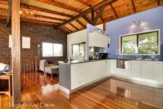 1 Falcon Court Mapleton Qld 4560 $478,000 Quietly nestled in a private leafy cul-de-sac is this home with character and appeal. On the upper level the home opens up into a generous area that accommodates the kitchen, family and dining rooms. This provides a spacious, open plan living area with a pleasing north-east aspect. Across the room a high, vaulted ceiling enhances its spacious look and the living space is warmed by hardwood floorboards. This is a pleasant, light-filled family room creating a user-friendly entertaining area. The modern galley-style kitchen is part of the spacious living area allowing family and friends to never miss any of the activities whilst preparing scrumptious meals. Winters are well catered for with the combustion stove in the lounge area. With three good sized bedrooms including an air conditioned master bedroom, there is plenty of room for all. The bathroom is more than generous and well-appointed and there is a separate WC for convenience. The ground floor level accommodates a generous double garage, laundry, bathroom and a large, fully tiled rumpus room with external access that could be used as a home office or even a dependents private space. The downstairs patio, overlooking soothing, sun-dappled gardens, sits atop a large rain water tank and the near level 809m2 parcel of land is very easy to maintain. The property is located in a prime position, ideal for a family, and so close to the village and a good selection of schools. Ideally set for living convenience, this is a must see home. Features Deck Smoke Alarms Pot-belly stove Safety Switch Property Details Property Type: House Bedrooms: 3 Bathrooms: 2 Garages: 2 Land Area: 809m2