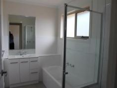 1/232 Vickers Rd Lavington NSW 2641 For Sale $295,000 * Under construction, modern & smart design home with ultra modern colour scheme & decor. * Offering a formal lounge, open plan family/dining area, a designer kitchen with quality appliances including dishwasher, tiled floors and ample cupboards and pot-draws. * 3 generous bedrooms with built-in robes, master bedroom with a large en-suite and ducted heating and cooling throughout. * Fully landscaped low maintenance yard, undercover rear entertainment plus secure fencing and rainwater tank. * Double garage with remote and internal access. This property offers comfortable and easy modern living at every turn. * Separate Community Torrens Title and only two on the block, suitable for young executives, investors or retirees, close to all amenities and transport. Take advantage of this opportunity to secure a new property and save on stamp duty-off the plan and take advantage of government grants on new home purchases. When you combine comfort, style, quality and location you get perfection! Features General Features Property Type: Townhouse Bedrooms: 3 Bathrooms: 2 Outdoor Garage Spaces: 2