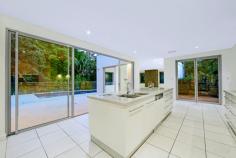 4A Hope St Pymble NSW 2073 Stylish & Sophisticated 6Beds3Baths2Cars Chic modern masterpiece, peacefully private yet wonderfully convenient to all upper north shore amenities such as schools, shops and station. Cleverly designed, flexible layout with the scope to use as a 4 bedroom with extra living or as 6 bedrooms, all with built-ins, if so required. Magnificent sun-drenched indoor / outdoor living and entertaining areas flowing to fully tiled pool and spa. Gourmet kitchen features all Miele appliances comprising 5 burner gas cooktop, steam oven plus 2 conventional ovens and dishwasher. Suiting families of all ages and particularly those with teenagers who can enjoy their own wing downstairs. Upstairs master suite with dressing room and full sized en-suite with bath, plus 2 additional bedrooms with built-in robes and desks separated by large media room. A rare opportunity to just move in and enjoy all that this superb home and desirable location have to offer. Situated in a prime east side walk station location convenient to the finest private & public schools and short stroll to the village