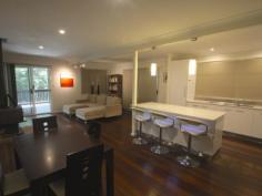 874 Terania Creek Rd Terania Creek NSW 2480 $575,000 Approximately 50 lush acres positioned 10 minutes drive from the beautiful Nightcap National Park and Protestors Falls. Recently renovated 4 bedroom home. The modern, refurbished kitchen includes a butchers bench and five burner gas stove. The kitchen opens out into an airy dining/living area that has polished timber floors and sliding doors that lead out onto beautiful, wide verandahs. There is a private, second dwelling that has been recently renovated and offers self-contained living and privacy from the main house. Huge, undercover area that has enough room for four cars! Tastefully landscaped with a terraced vegetable garden and walking tracks that take in the large variety of fruit trees. Access to your very own, secluded swimming hole positioned on Terania Creek. Photos do not do it justice! Solar hot water, 3x 5000 gallon (total approx 60,000 litres) tanks and mains power. Phone reception and internet available. The acreage has a balance of cleared, elevated areas with views over Terania Creek Valley and beautiful, ancient stands of rainforest. There is also a second creek and dam located on the property. A school bus goes past the front gate. With so much to offer, why not inspect