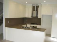 1/47 Hilltop Road Merrylands NSW 2160 BRAND NEW MASTER BUILT HOME 5 2 1 Quality new home with all the bells & whistles including tiled living areas downstairs. Fully air conditioned, security alarm, ducted vacuum, remote garage door, intercom system, quality stainless kitchen appliances, down lights, vertical blinds & carpets. Upstairs has 4 bedrooms with built in’s, main bedroom has an en suite and walk in robe, it also has a sliding glass door to the balcony at the front. The family bathroom is on this level and completed with quality finishes and fittings. Downstairs, the open plan living area looks out onto the level landscaped back yard which includes a covered entertainment area with lights and ceiling fan and gas connection. The gourmet kitchen looks onto the family room and has granite bench tops & walk in pantry & stainless steel appliances. The 5th bedroom / study / office is at the front of the house with a separate toilet and laundry. Close to schools, shops and bus at the door. You will not find a free standing home in this area as good as this