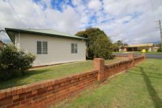 43 Cox Street Mudgee NSW 2850 $249,000 Situated only two blocks to the Mudgee CBD is this two bedroom plus sunroom home. Located on a corner block of 1,189 sm approx. The home presents in original condition and lends itself to renovators and first home buyers. The clad home has two bedrooms at one end adjoining a living area that contains a wood fire. There is an eat in kitchen that is of good size and the bathroom, laundry and w/c are all separate. The rear sunroom has a lovely North/Easterly aspect and opens onto the secure rear yard. The property has off street parking for two vehicles and plenty of space for the kids and pets. The property is accessed via two wide street frontages which gives the feeling of not being hemmed in. An easy walk to town to enjoy the cafes and resturants of Mudgee and easy access to schools and amentities. Property Details Bedrooms 2 Bathrooms 1 Garages 2