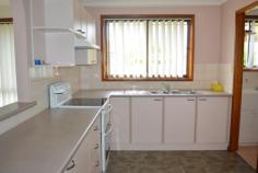 9/3 Sandpiper Close Harrington NSW 2427 $240,000 Invest or nest! Villa - Property ID: 772126 - This 2 bedroom villa in a complex of 11 is being offered for sale - Perfect for the investor or for that holiday getaway - Open plan living and dining area with cathedral ceilings and complete with ceiling fans and air conditioner - The kitchen leads to a sunroom/study with access to the covered, decked al fresco area - 2 good sized bedrooms with built in robes - 3 way bathroom for convenience - Single garage with internal access to house and loads of storage shelves - Private courtyard - Easy to manage villa and yard