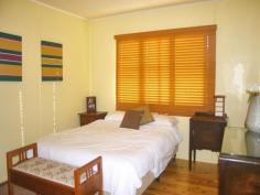 29 Curtis St Dalby QLD 4405 For Sale $259,000 Features General Features Property Type: House Bedrooms: 3 Bathrooms: 1 Land Size: 918 m? (approx) Indoor Air Conditioning Outdoor Garage Spaces: 2 You'll be impressed the moment you walk in the front door of this warm & welcoming home in West Dalby. In fact, I bet you'll be impressed from the first time you drive by. Set behind the classic white picket fence, your new home is fresh & modern and offers a good amount of space for starters. From the front verandah, enter into the L-shaped lounge/dining area, boasting polished timber floors and reverse cycle air-conditioner. The galley style kitchen is modern in design and overlooks the backyard, with near new stainless steel appliances including gas cooktop & dishwasher. All 3 bedrooms are quite generous in size; 2 having huge built-in robes and the main is air-conditioned as well. The backyard is a great spot to spend summer afternoons with plenty of shade & lawn to play on. The outdoor living area is a treat as well with 3 ceiling fans helping to keep the cool. Gardeners will appreciate the rainwater tank, shadehouse, and the separately fenced veggie beds & tool shed. Tinkerers will also have a place to work on their projects with the powered shed. With all this on offer in a great position without flood worries, you'll be sorely disappointed if you miss out, so call now to arrange your inspection! Energy Efficiency Rating: 0.0-star NABERS Energy Rating
