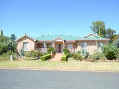 26 Williams St Temora NSW 2666 $465,000 BE SURPRISED AT THIS PEACEFUL LOCATION! Looks can be deceiving because this home has so much to offer! So be surprised with this brick veneer home seated on 2 building blocks: ? 4 bedrooms, all with built in robes ? Ensuite featuring a beautiful corner bath, vanity, toilet & shower ? Large pillars greet you as you walk into the lounge room ? Kitchen has a lovely modern flair & storage galore, boasting gas stove, dishwasher & pantry ? Undercover sunroom off dining area ? Ceiling fans in bedrooms, gas heating in lounge room, reverse cycle air cond at front door ? Main bathroom houses a bath, shower & vanity ? Double carport adjoins the house with direct entry inside, perfect for those wet days ? Cement driveway to the enormous back shed, perfect for the hobbyist ? Yard is filled with gorgeous roses, yummy fruit trees and walkways meandering through this self sustainable garden So if you are looking for room to move, with the privacy you need in a peaceful area then stop looking, you will have to see to believe! Contact the friendly professional team today! For Sale $465,000 Features General Features Property Type: House Bedrooms: 4 Bathrooms: 2 Indoor Toilets: 2 Built in Wardrobes Gas Heating Split system Air Conditioning Outdoor Remote Garage Carport Spaces: 2 Outdoor Entertaining Area Shed Inspections Inspections by appointment only
