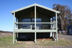 2671 Shannons Flat Rd Shannons Flat NSW 2630 Located approximately 25 kms NNW of Cooma along Shannons Flat Rd set on approx. 260 acres or 107.7 hectares of slightly undulating country boasting some magnificent views towards Yaouk, The Four Mile, Cooma, Nimmitabel alike. Approx. 80% arable and 20% lightly timbered with some pasture improved including Phalaris and Clovers. Well fenced into some 5 main paddocks, with some strategically placed small holding paddocks. Fenced and designed with horses in mind, 6 dams. Comfortable rustic dwelling originally a shearing shed, now converted to a great abode with quality finishes- All approved! Open plan living, combustion fire, huge entertaining deck with northerly aspect, exposed timber beams, modern kitchen and bathroom, large bedroom with built-ins, and NY style laundry, Wunderlich louvre windows, well insulated, gas cooking, infinity hot water and 2 rain water tanks. Garaging for two, workshop, unloading/loading stage and ample storage. All this less than 1.5 hours drive from Canberra or 20 or so minutes from main street Cooma.