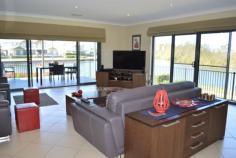 2/8 Diamantina Circuit Harrington NSW 2427 $620,000 180 degrees of water Townhouse - Property ID: 752150 From the sunrises that entice you out of bed to the spectacular sunsets you will never tire of the ever changing views... from the pelicans that glide past to the dolphins that frolic outside your living room With water out look from almost every room it feels like you are sailing - Open plan living, dining and kitchen complete with gas cook top and dishwasher - Access to the covered outdoor entertaining area flows from the living area - Ground floor master bedroom with WIR and ensuite featuring a corner spa - Up stairs the views just get better stretching across the Manning River to Manning Point - 2nd living space with access to the balcony - 2 good sized bedrooms with built-ins - Super sized master bathroom with walk in shower, large spa bath and display cabinet - Ducted air conditioning for year round comfort - Access to the river walkway - Powder room for the guests - North East aspect - Easy care garden...so much more
