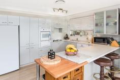 338 Dobell Dr Wangi Wangi NSW 2267 $790k Single Level Waterfront Reserve People come from near & far to spend their holiday time on Wangi Point. It feels removed from the world with clean water to fish & boat, and walking trails along the ridge line and conservation area. Most homes on the point have a beautiful environment, but access can be difficult with steep drive ways and multi-storey designs. With the infamous Pulbah Island as your backdrop. 338 Dobell Drive has a level driveway to a 8m x 7.5m garage with an extra high 2700mm clearance and auto door. Along with your cars, there is also room to accommodate a boat or caravan. Inside the home is single level, but with space. Ducted air-conditioning in every room, the rumpus area is big and can be closed off for privacy & quiet time, whilst the open plan family & dining area is perfect for bringing everyone together, framed by the bay window overlooking the lake. Comprising 4 bedrooms, the master takes pride of place on the waterside, with walkin robe and en-suite, whilst the remaining 3 have built-ins, and bedrooms 2 & 3 accommodate queen beds. With a mature tree setting, the black deck has the right balance of nature with the blue water view and access to the foreshore. A home for both families and retirees, you can bring together practicality and lifestyle. Inspection Times Please Contact Office Land Size 1046 m2