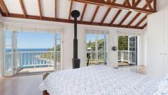 185 Whale Beach Rd Whale Beach NSW 2107 Enchanting Oceanfront Beach House with Inspiring Bay Views Built with a classic coastal ambiance and unique Caribbean style, this private residence is one of Whale Beach's best kept secrets. Set on 950sqm of oceanfront land in secluded Dolphin Bay, this is the ideal weekend 'hideaway' or family home overlooking paradise. - Incredible views from all levels into the azure waters of Dolphin Bay - Classic, refurbished timber and masonry beach house set over three levels oozing character and charm - Open plan living areas flow to a choice of sun-bathed timber decks perfect for either entertaining, or relaxing - The classic white pallet and natural timbers produce light, bright interiors with an effortless feel and provide flexibility for the modern lifestyle - Spacious country style entertainers kitchen with European appliances allows for easy entertaining overlooking the ocean - The Master bedroom is truly something special. Spacious and relaxing with high exposed beam ceiling, large private terrace and fireplace - Additional bedroom on the top floor or parents study/retreat - Two bedrooms on the lower level both with built ins, serviced by bathroom and separate WC - Featuring timber floors, two open fireplaces & large windows looking out to the ocean from all rooms - Plenty of off-street parking for four cars This rare and exclusive location combined with the classic coastal ambiance of this beach house will pull at your heart strings and have you longing for your weekend break. Property Snapshot Property Type: House Construction: Timber Features: Dishwasher Dryer Ensuite Gas Study Washing Machine